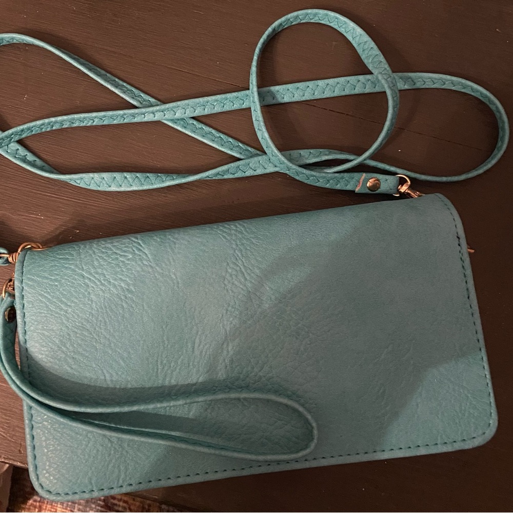 Maurice cross body blue/ aqua marine pocketbook or clutch.